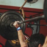 What are the best treatments for knee pain in CrossFit athletes?